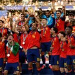 Spain national football team celebrates FIFA World Cup victory with the championship trophy
