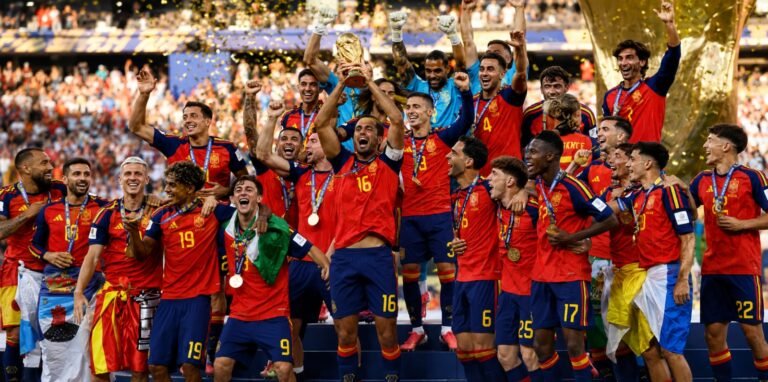 Spain national football team celebrates FIFA World Cup victory with the championship trophy