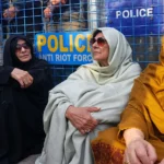 Imran Khan’s sisters and lawyers wait outside Adiala Jail after being denied permission to meet the former prime minister.